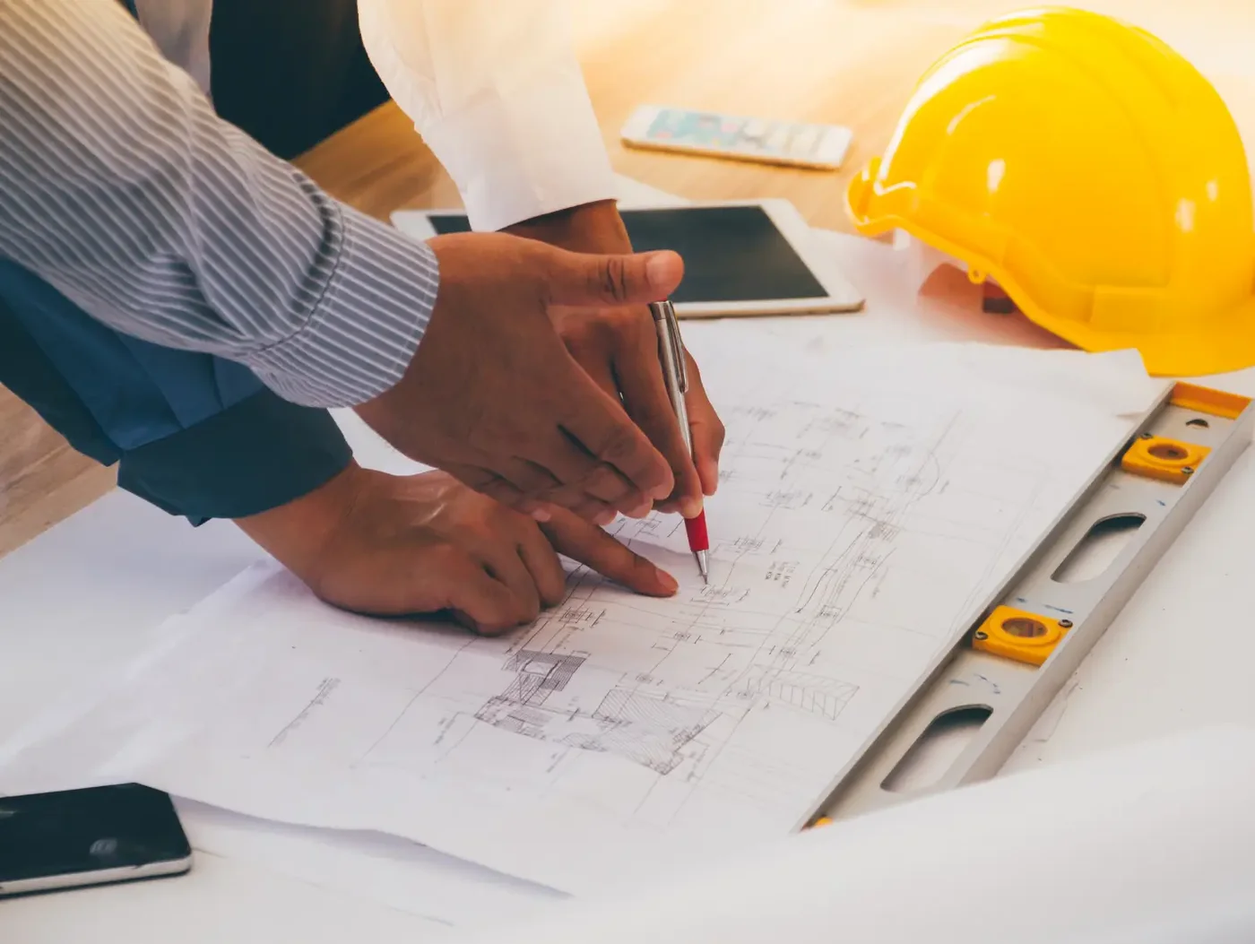 team-of-engineers-discussing-architecture-plan