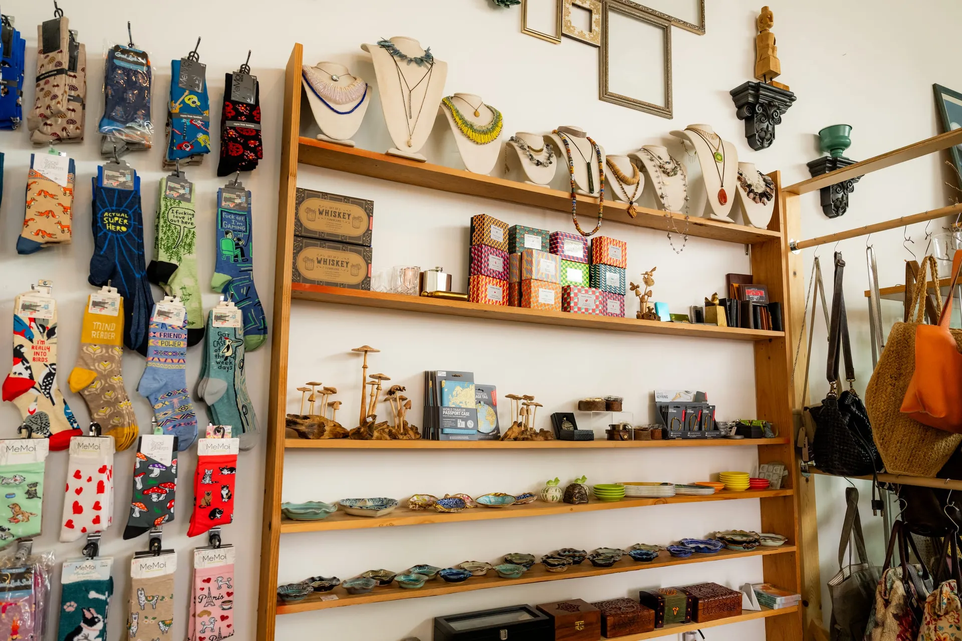 Socks, jewelry, and curated goods on display at Antiqua