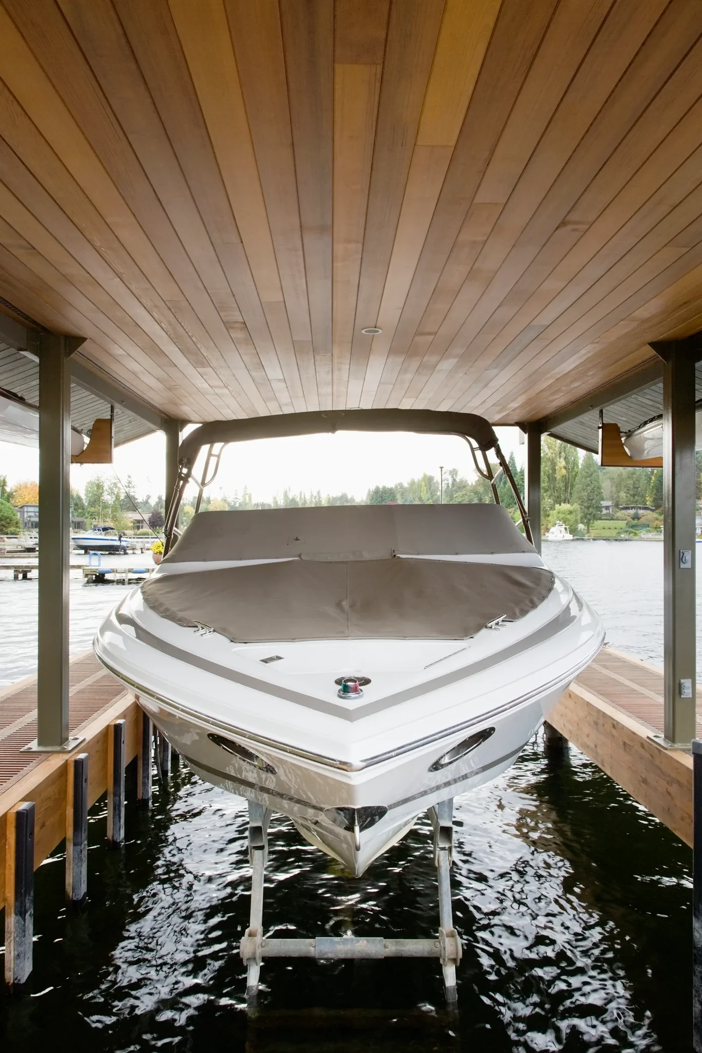 Electric boat lift installed on a residential dock