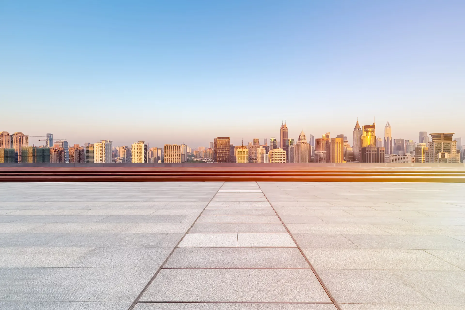 flat commercial rooftop overlooking city skyline