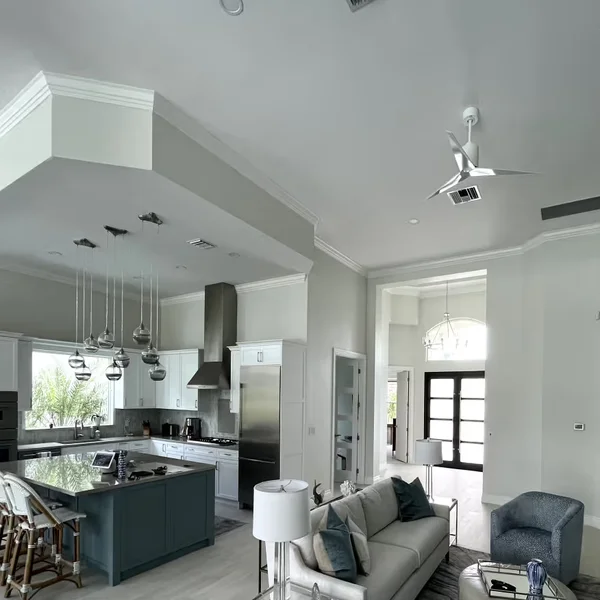 A freshly painted residential kitchen and living room