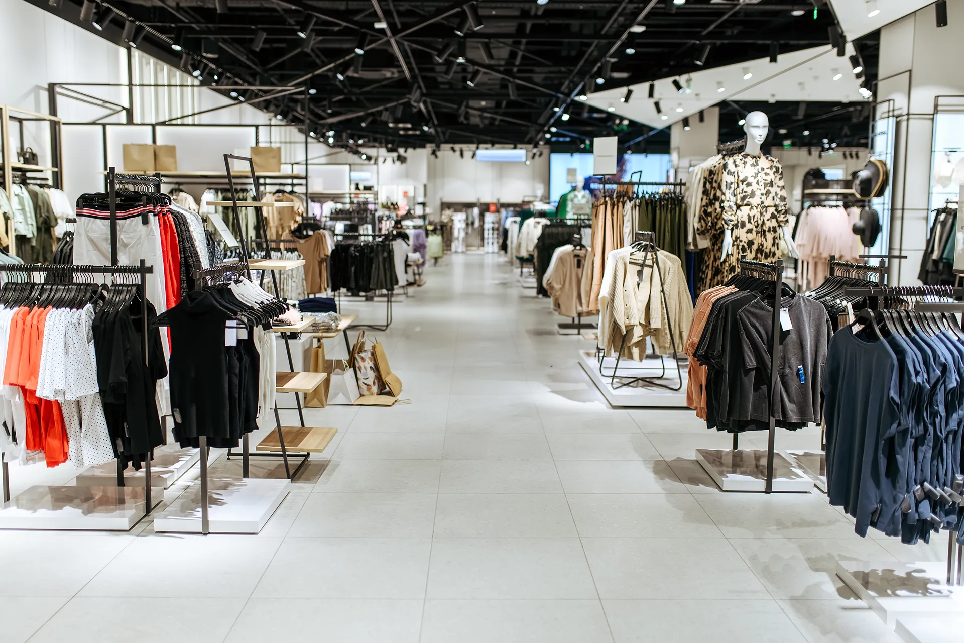 interior of a clothing store with wide walkways