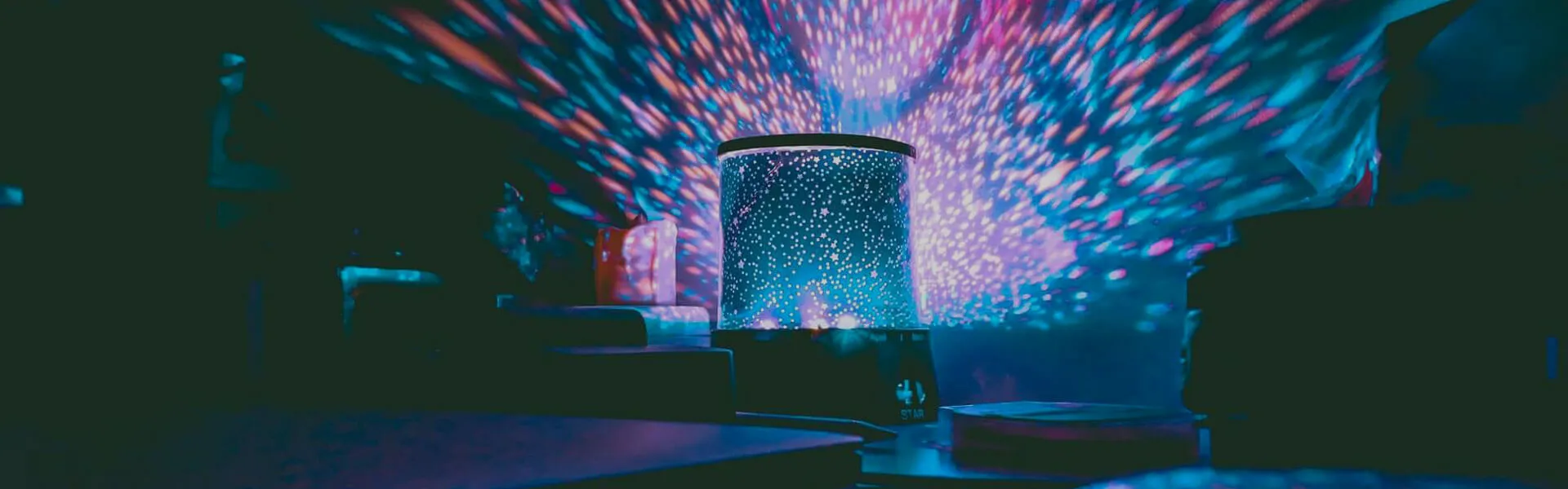 LED lighting effects scattering color across an event room
